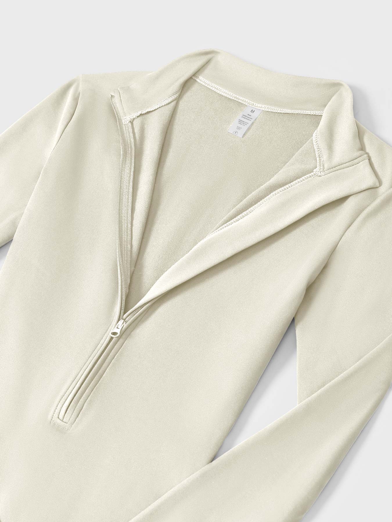 MONO CON CREMALLERA Y MANGA LARGA