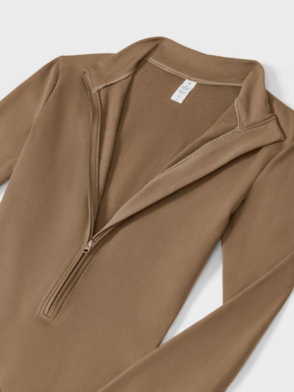 MONO CON CREMALLERA Y MANGA LARGA