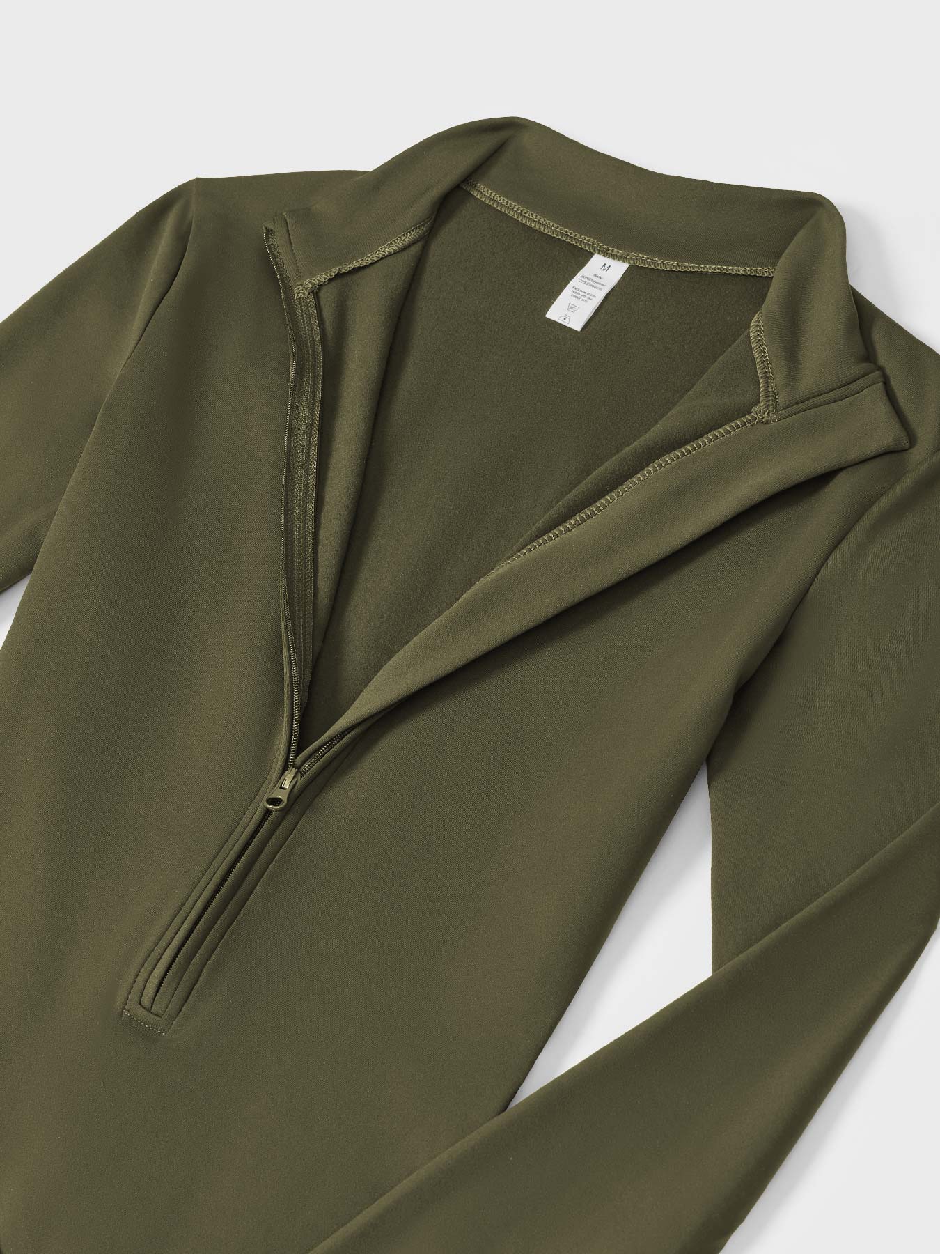 MONO CON CREMALLERA Y MANGA LARGA